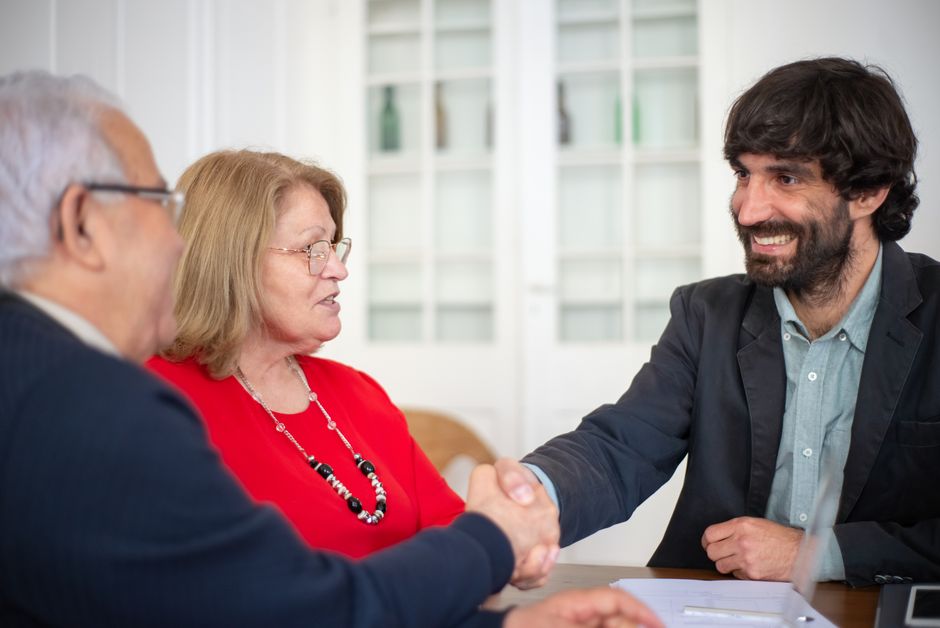 A trade consultant discussing market strategies with agricultural sector clients