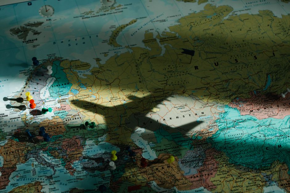 World map with flight routes and connections