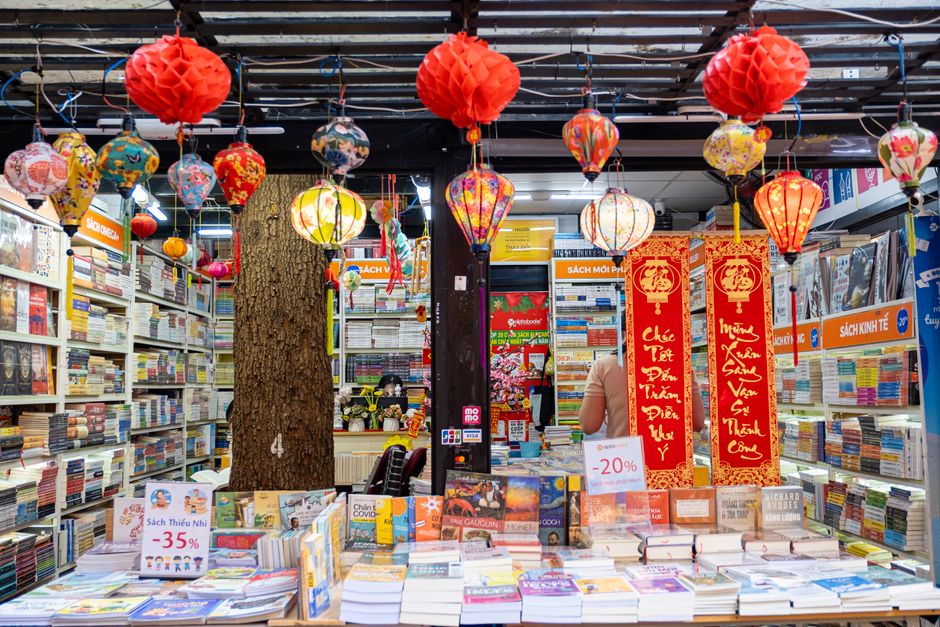 Shelves filled with discounted books in a bookstore setting