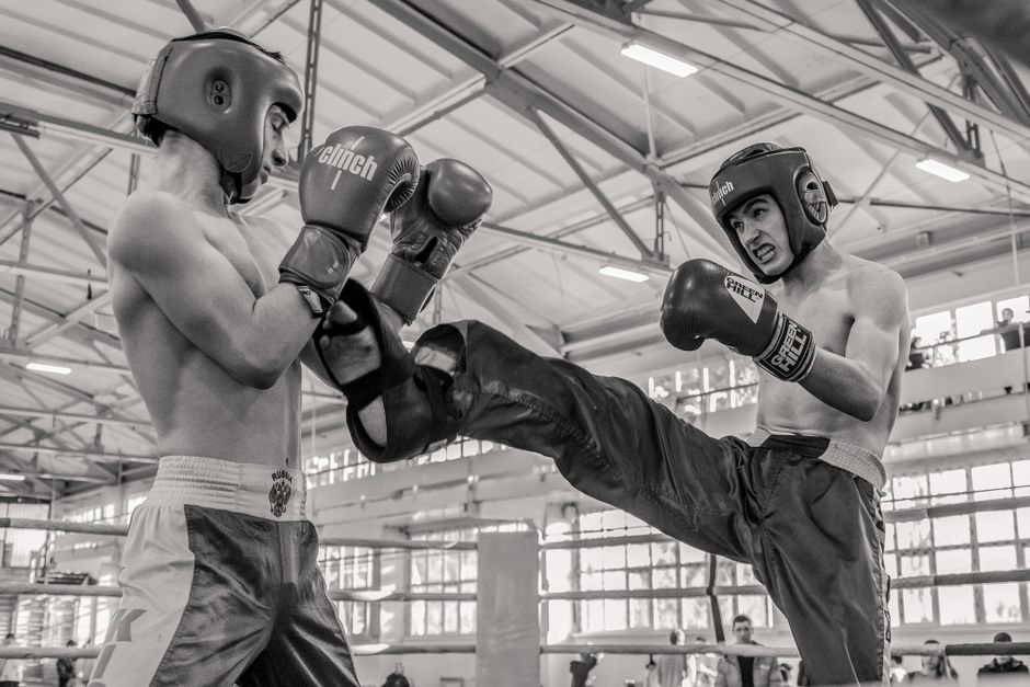 Kickboxing club interior with community members preparing for class