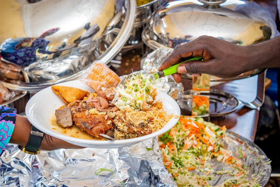 Ghanaian food truck serving West African customers at an outdoor event