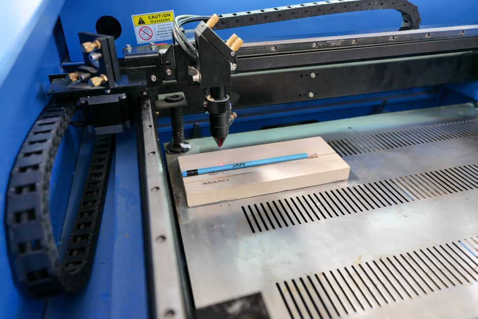 Posters, stickers, and laser-engraved branded materials