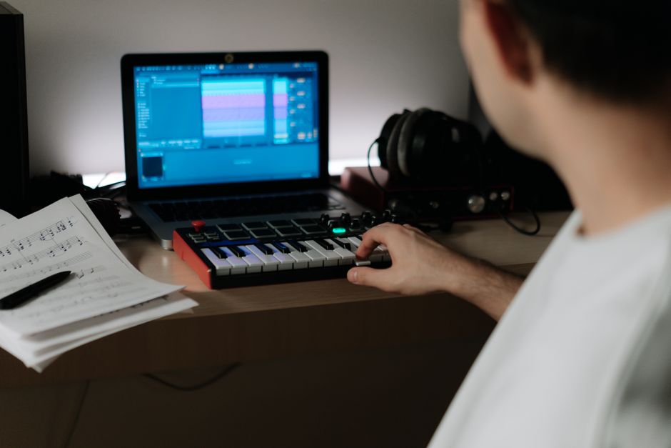 Audio engineer designing sound effects with mixing equipment